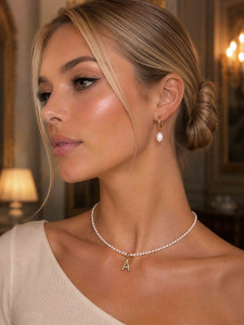 Earrings with a pearl pendant 5352
