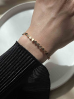 Золотой браслет с сердечками 5624