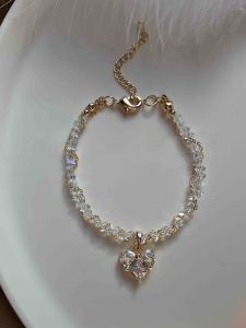 Хрустальный браслет с сердцем и цепочкой в золоте 5635